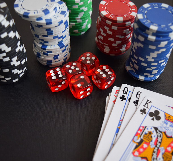 Subtract Casino game objects on black table and game room background